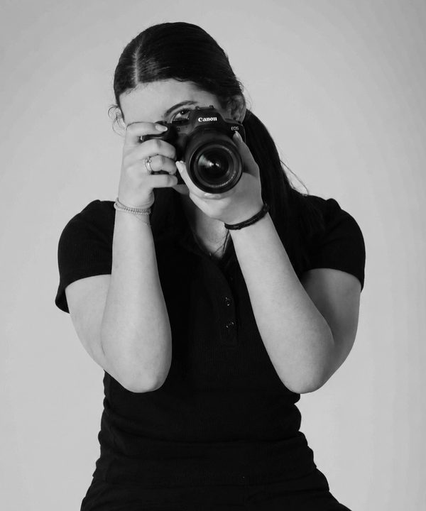 Georgia looking through her camera