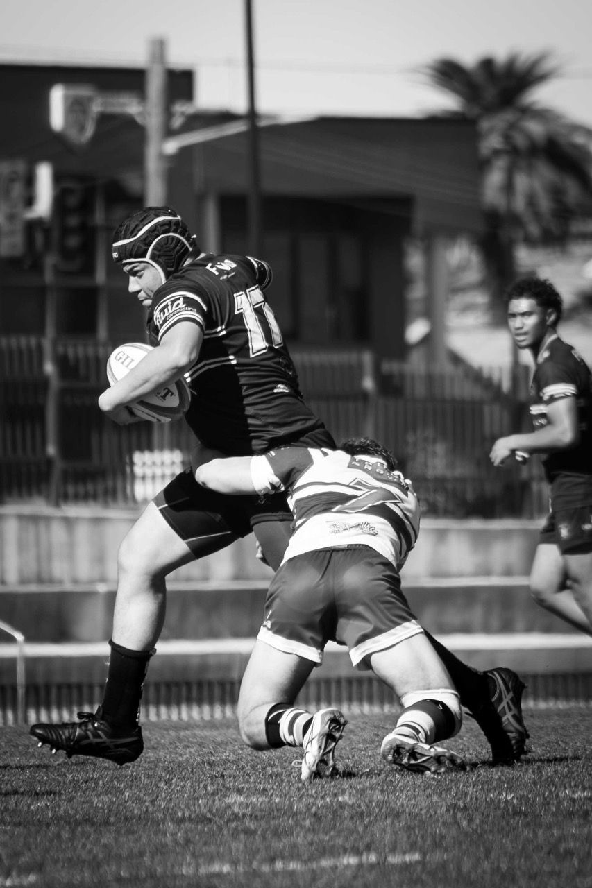 A ball carrier breaks a tackle