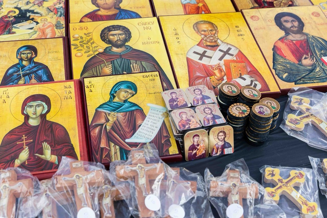Painted icons and wooden crosses on a market stall